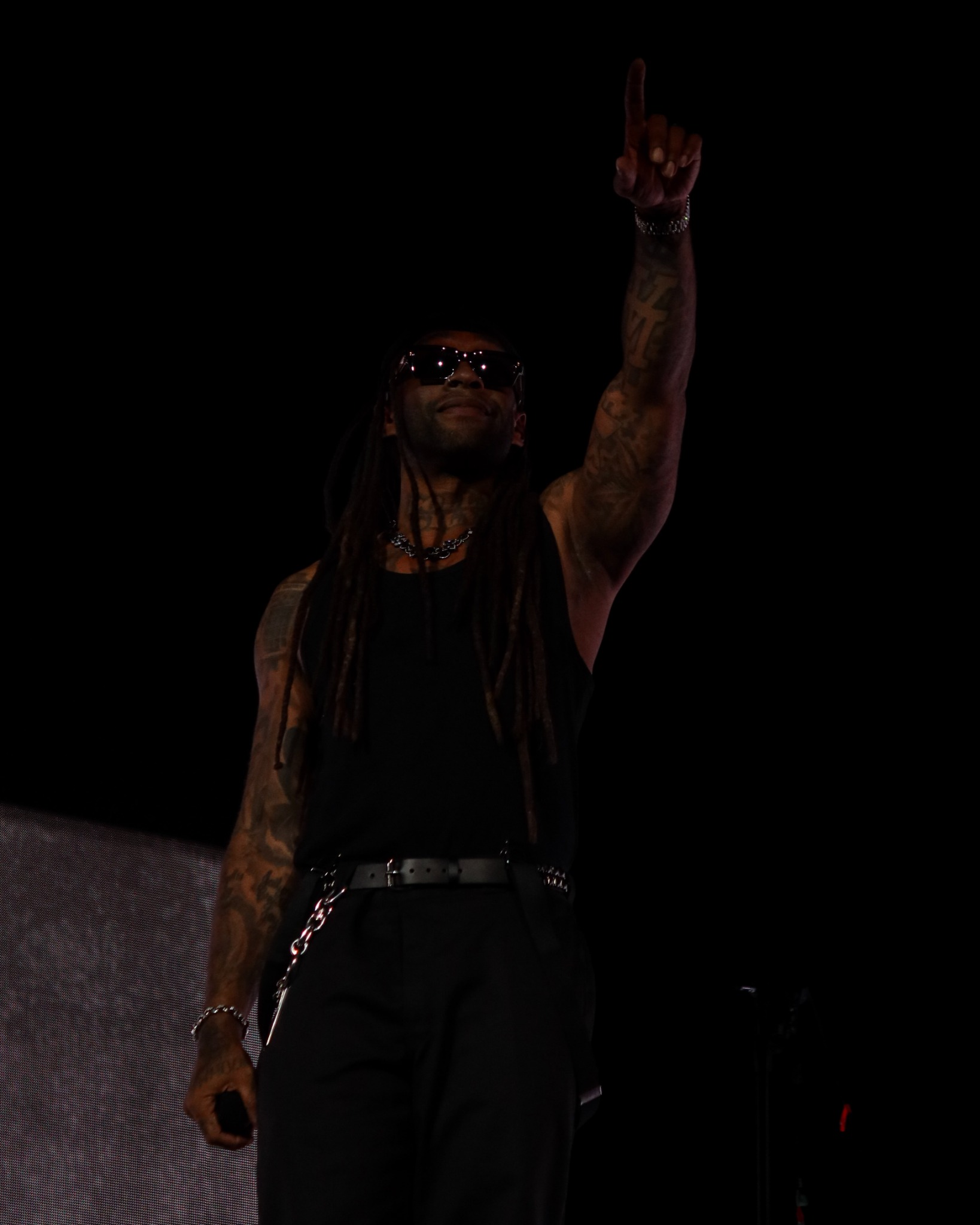 Ty Dolla $ign raising one hand during his performance